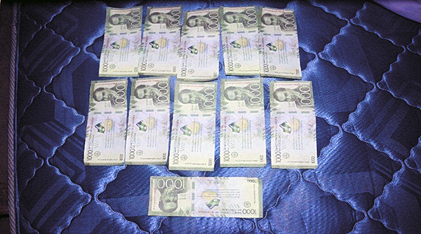 C$ 14, 000.00 en billetes de C$1000.00 falsos ha sido ocupados policía.